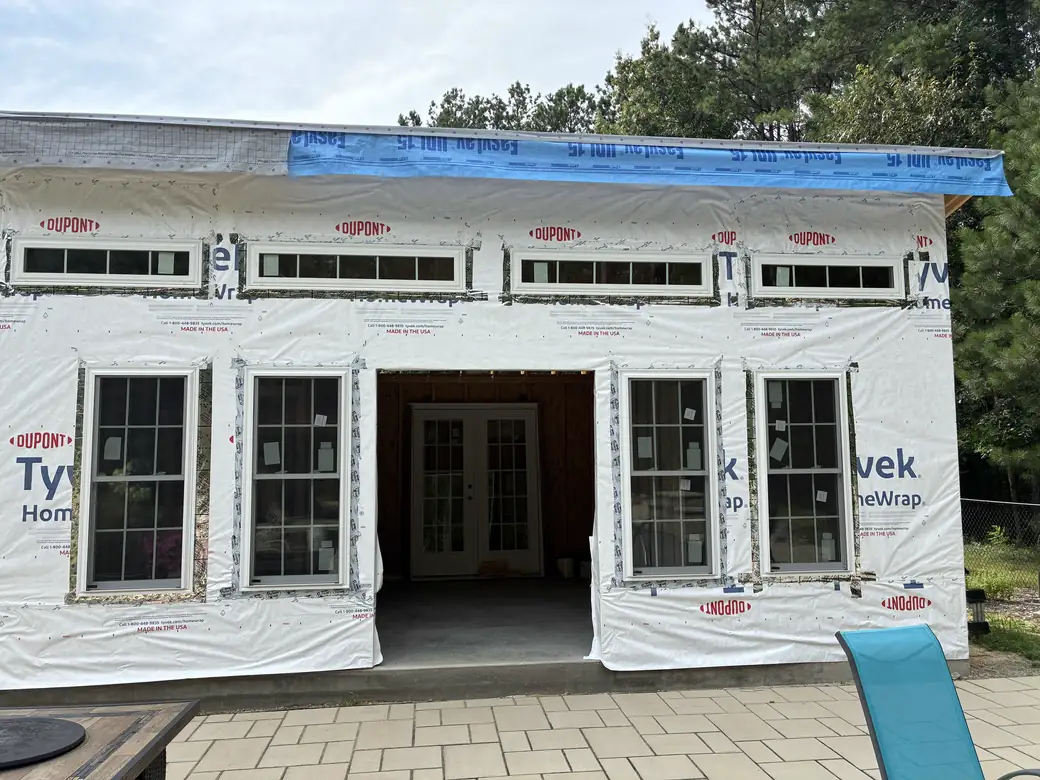 Pool house siding, window, and door installation