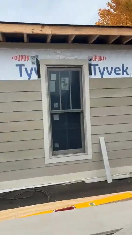 Siding and window trim out — video 2